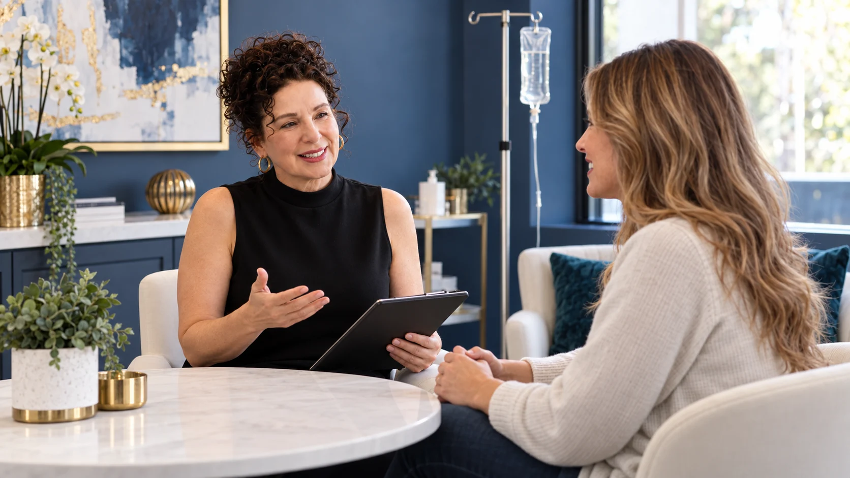 Provider consulting with a patient about personalized IV therapy at Revive Wellness & Beauty in Powell, Ohio